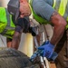 The 2026 Europe-Mediterranean Disinterment Team Prepares Remains for Transfer Case