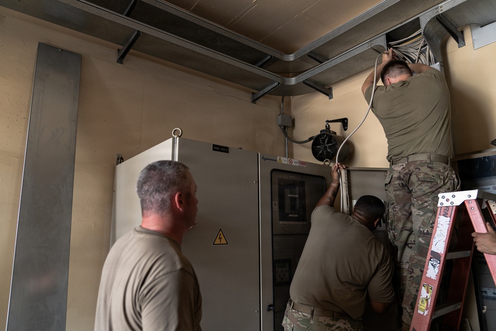 110th electricians assist with water chlorination adjustments