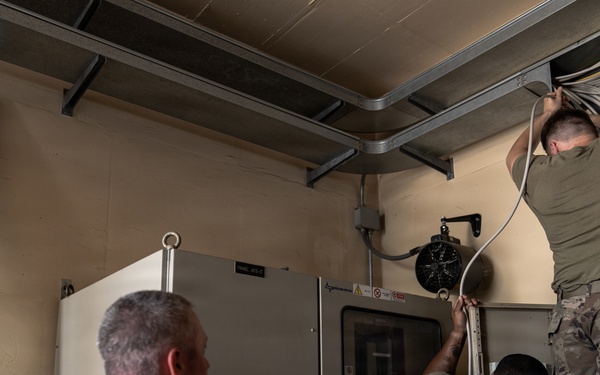 110th electricians assist with water chlorination adjustments