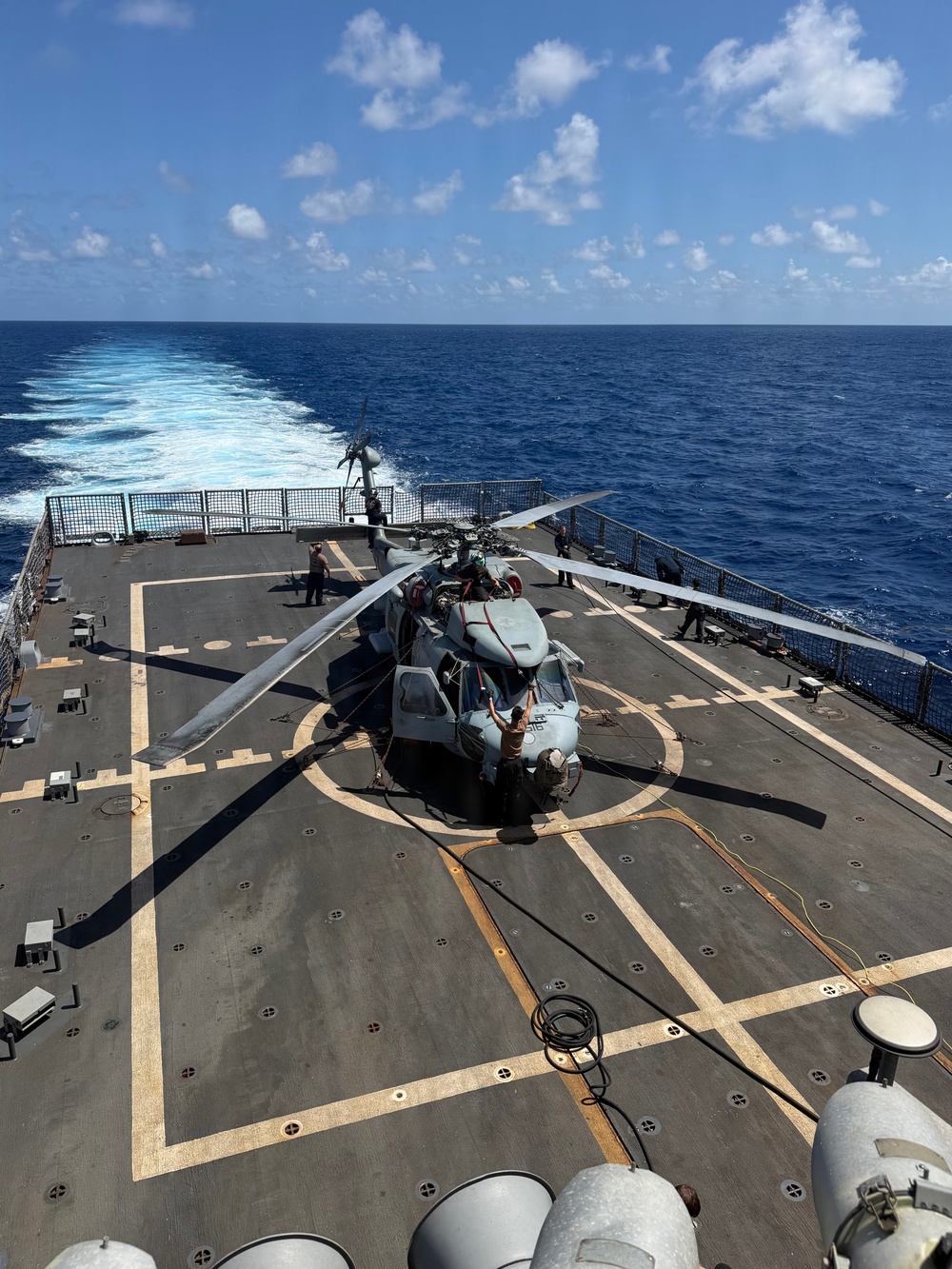 U.S. Sailors prepare an MH-60R Seahawk helicopter assigned to Helicopter Maritime Strike Squadron (HSM) 48, for flight while aboard the littoral combat ship USS Billings (LCS 15) in port at Ponce, Puerto Rico, June 26, 2026.