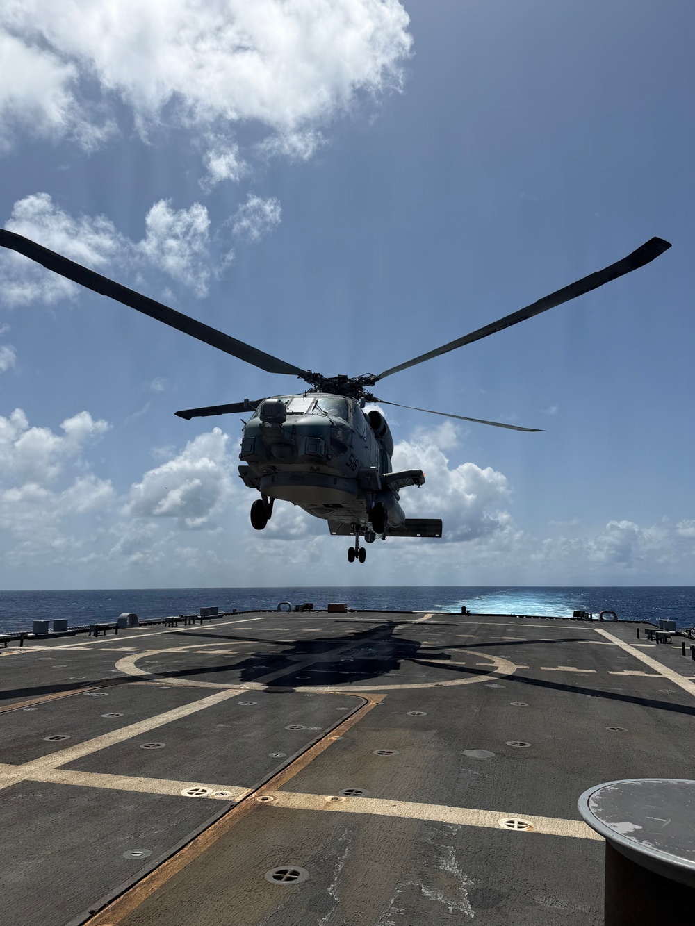 An MH-60R Seahawk helicopter assigned to Helicopter Maritime Strike Squadron (HSM) 48, lifts off for flight from aboard the littoral combat ship USS Billings (LCS 15) while operating in the Caribbean Sea, June 27, 2026.