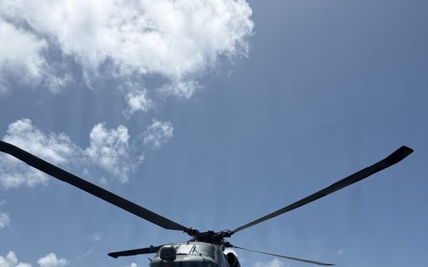 An MH-60R Seahawk helicopter assigned to Helicopter Maritime Strike Squadron (HSM) 48, lifts off for flight from aboard the littoral combat ship USS Billings (LCS 15) while operating in the Caribbean Sea, June 27, 2026.