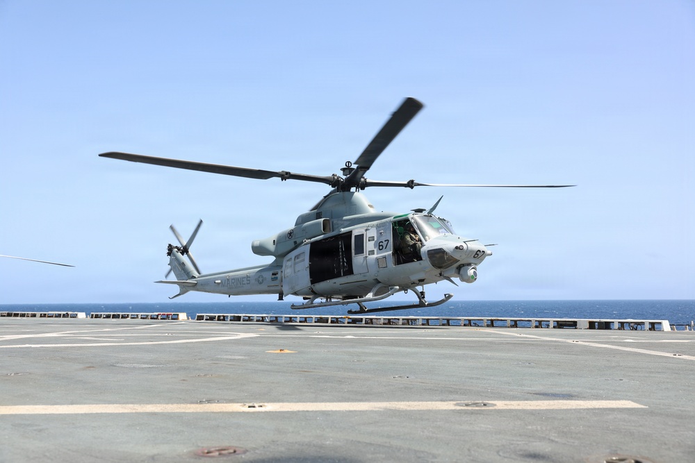 A UH-1Y Venom helicopter, assigned to Marine Medium Tiltrotor Squadron (VMM) 365 (Reinforced), Littoral Combat Force 24, lifts off.