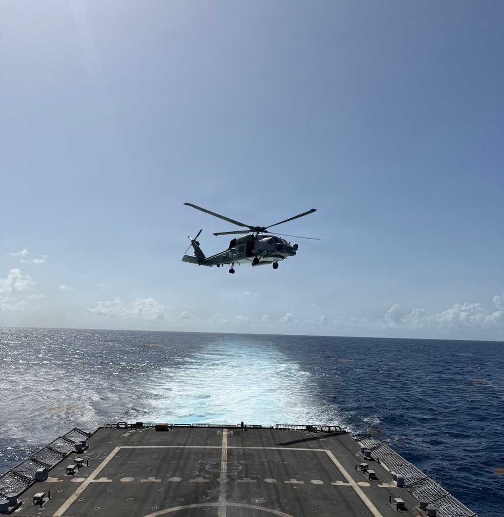 An MH-60R Seahawk helicopter assigned to Helicopter Maritime Strike Squadron (HSM) 48, lands aboard the littoral combat ship USS Billings.