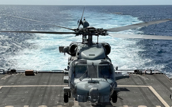 An MH-60R Seahawk helicopter assigned to Helicopter Maritime Strike Squadron (HSM) 48, lands aboard the littoral combat ship USS Billings.