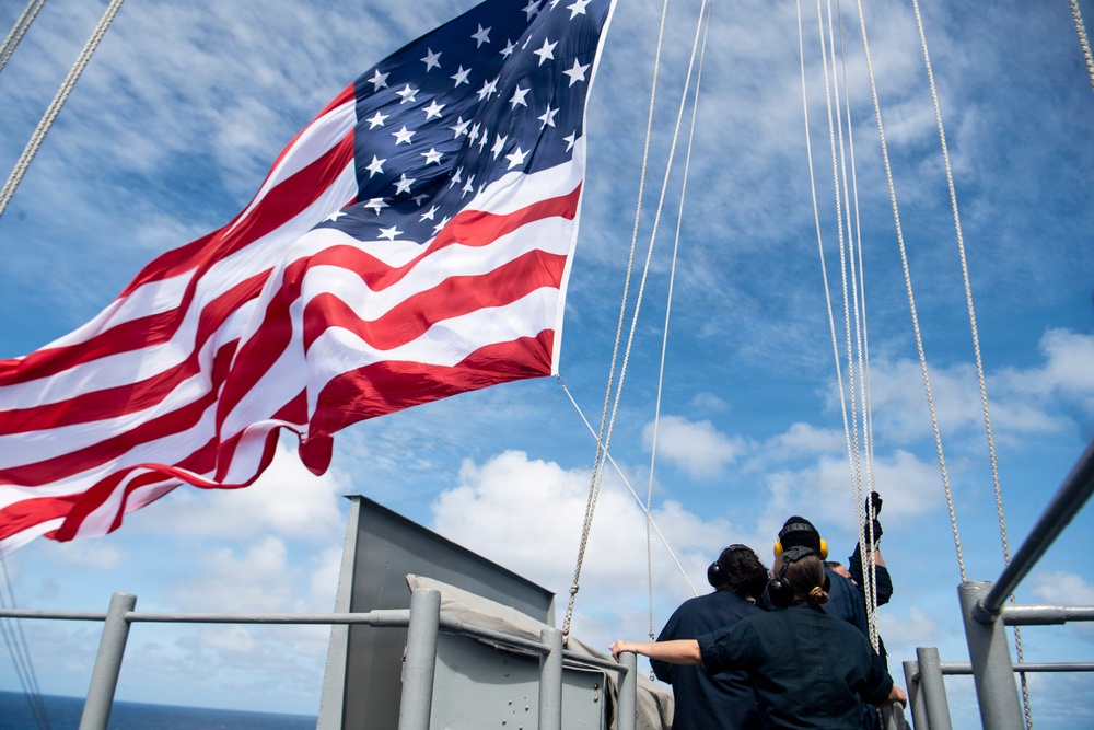USS Boxer Hoist Battle Ensign While Sailing in Formation