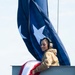 USS Boxer Hoist Battle Ensign While Sailing in Formation