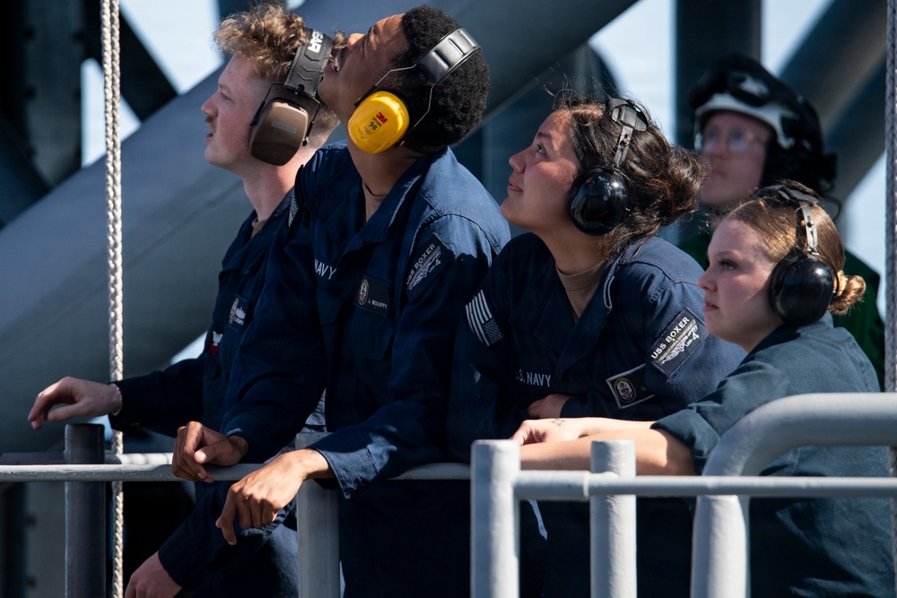 USS Boxer Hoist Battle Ensign While Sailing in Formation