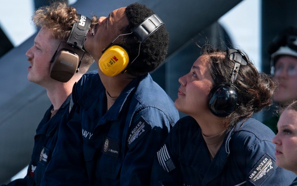 USS Boxer Hoist Battle Ensign While Sailing in Formation