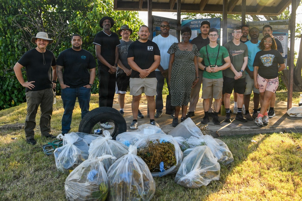 USS Theodore Roosevelt Carrier Strike Group and Carrier Air Wing 11 Sailors Participate in a Beach Clean Up During RIMPAC 26