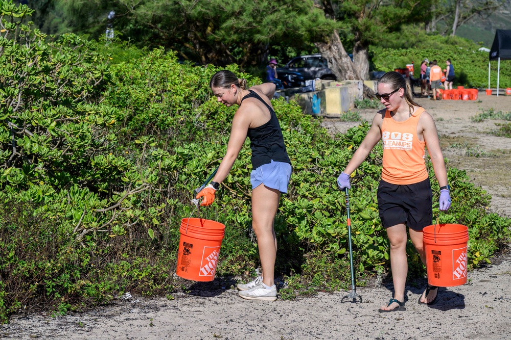 USS Theodore Roosevelt Carrier Strike Group and Carrier Air Wing 11 Sailors Participate in a Beach Clean Up During RIMPAC 26