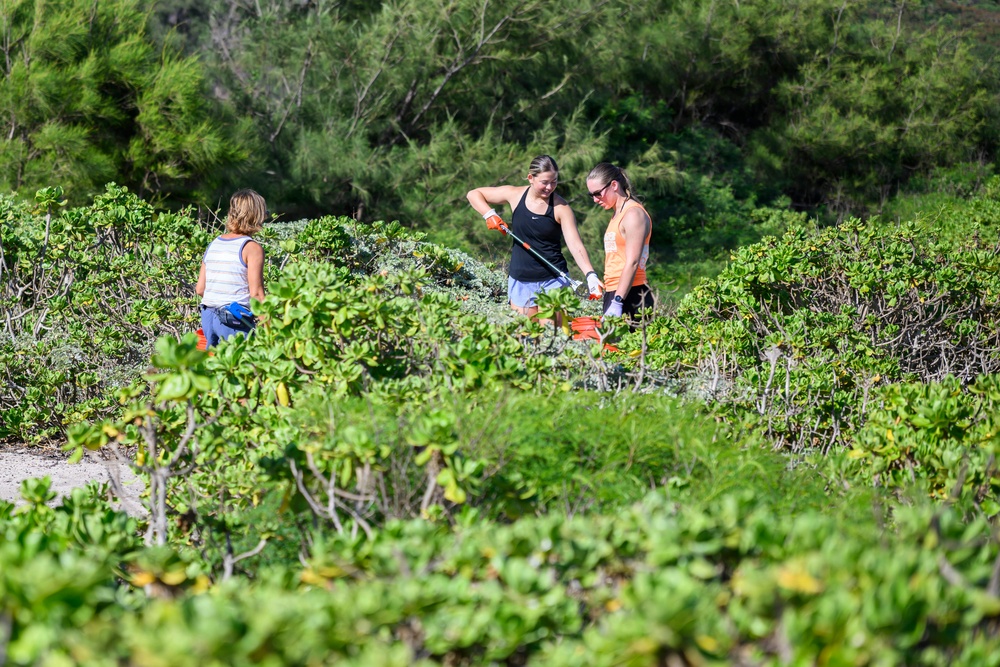 USS Theodore Roosevelt Carrier Strike Group and Carrier Air Wing 11 Sailors Participate in a Beach Clean Up During RIMPAC 26
