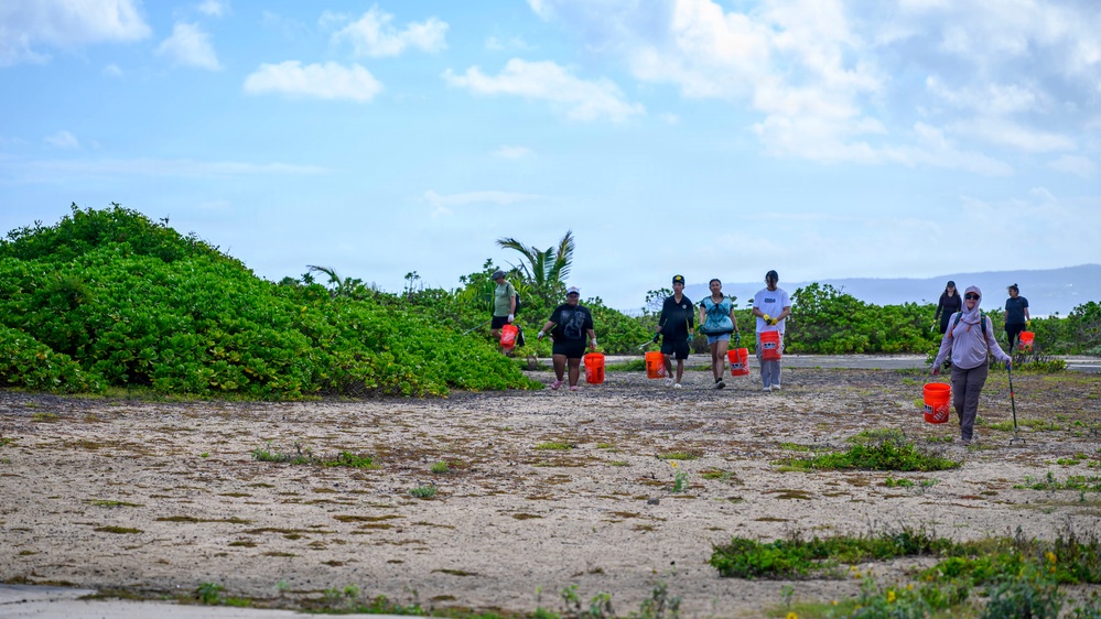 USS Theodore Roosevelt Carrier Strike Group and Carrier Air Wing 11 Sailors Participate in a Beach Clean Up During RIMPAC 26