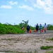 USS Theodore Roosevelt Carrier Strike Group and Carrier Air Wing 11 Sailors Participate in a Beach Clean Up During RIMPAC 26