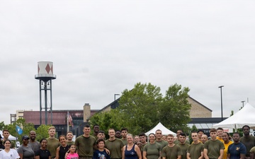 U.S. Marines and Sailors PT with the local Baltimore community during SAIL250 Maryland