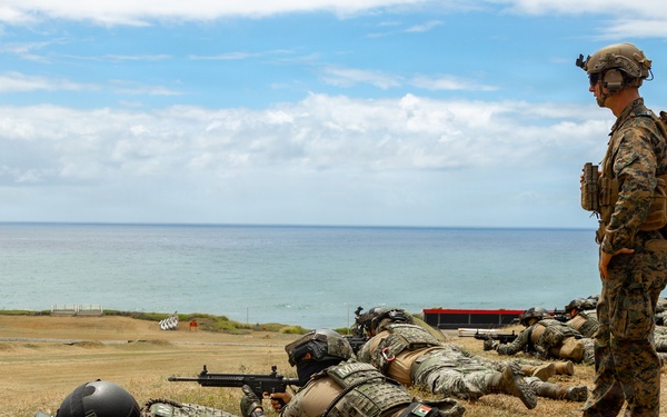 Multinational service members conduct live-fire training during RIMPAC