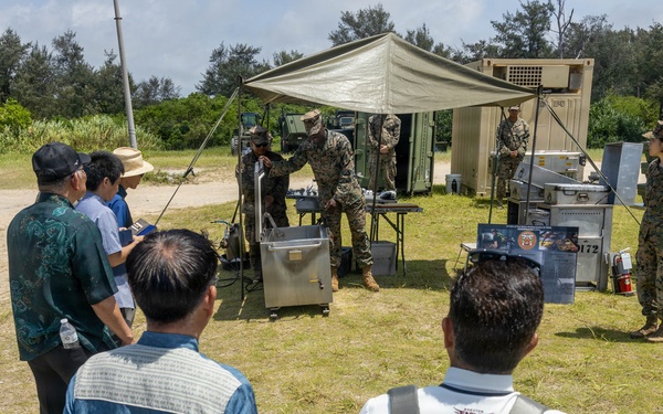 Freedom Banner 26: Local media and Japan Ground Self-Defense Force service members tour humanitarian assistance and disaster relief displays