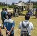 Freedom Banner 26: Local media and Japan Ground Self-Defense Force service members tour humanitarian assistance and disaster relief displays