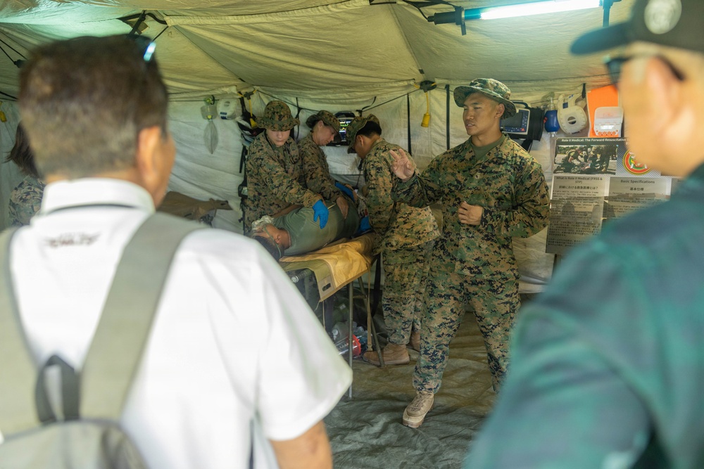 Freedom Banner 26: Local media and Japan Ground Self-Defense Force service members tour humanitarian assistance and disaster relief displays