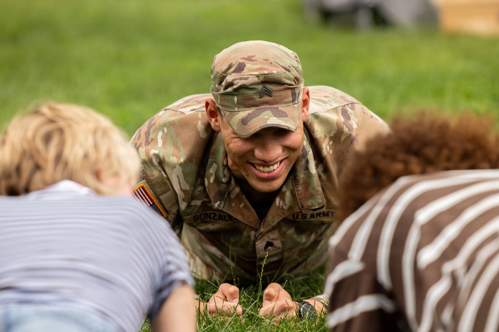 Service Members interact with attendees during the Great American State Fair