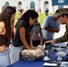 Service Members interact with attendees during the Great American State Fair