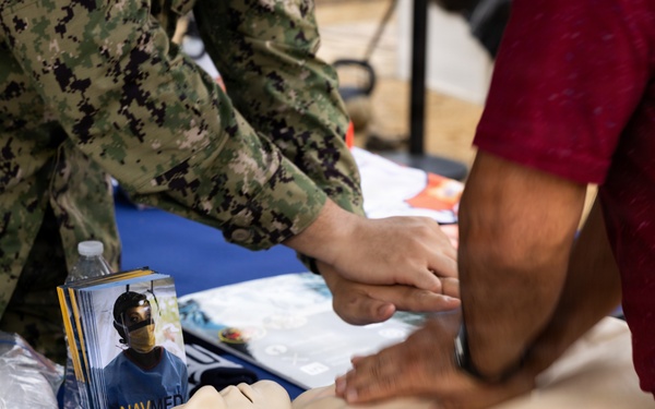 Service Members interact with attendees during the Great American State Fair