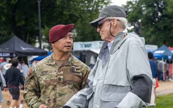 Service Members interact with attendees during the Great American State Fair
