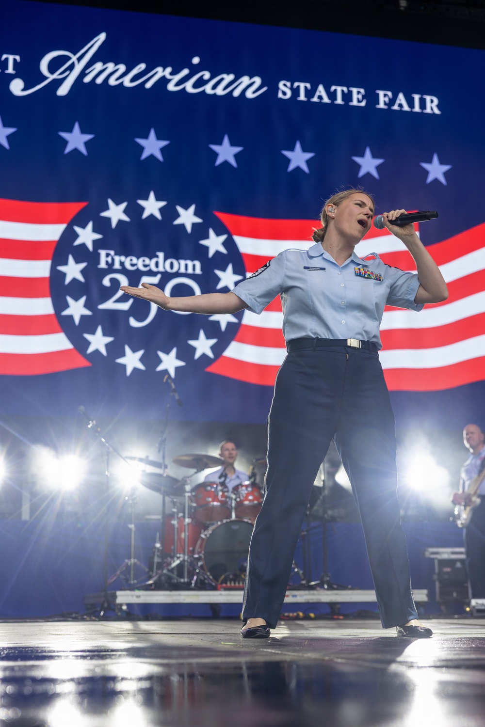 Service Members interact with attendees during the Great American State Fair