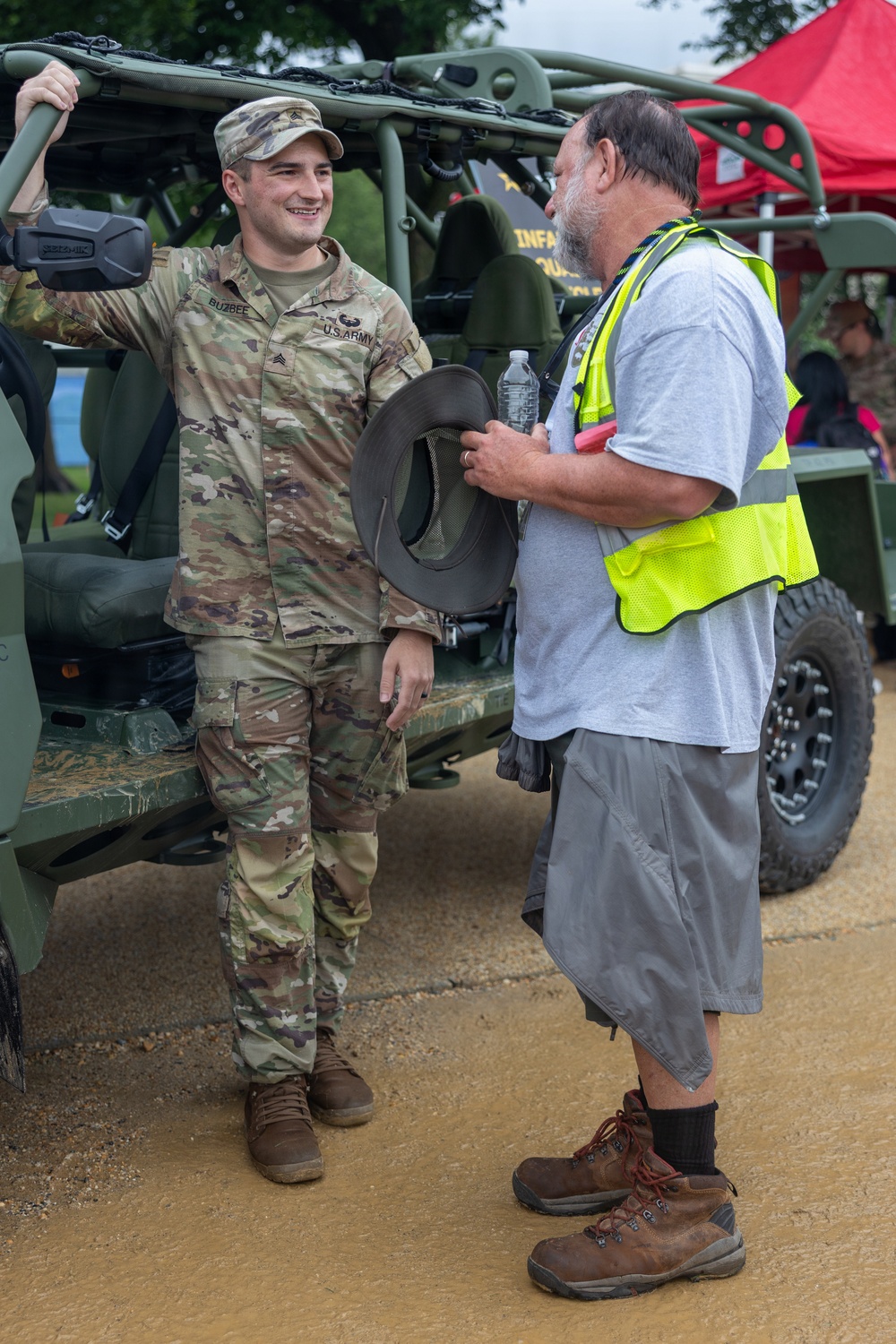 Service Members interact with attendees during the Great American State Fair