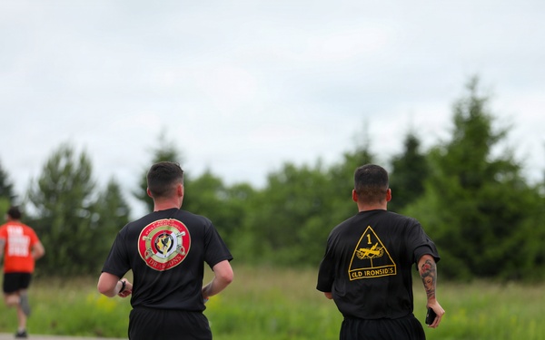 U.S. Army, British, French soldiers participate in a 4x4x48 charity event to help bring awareness to mental health and combat stress