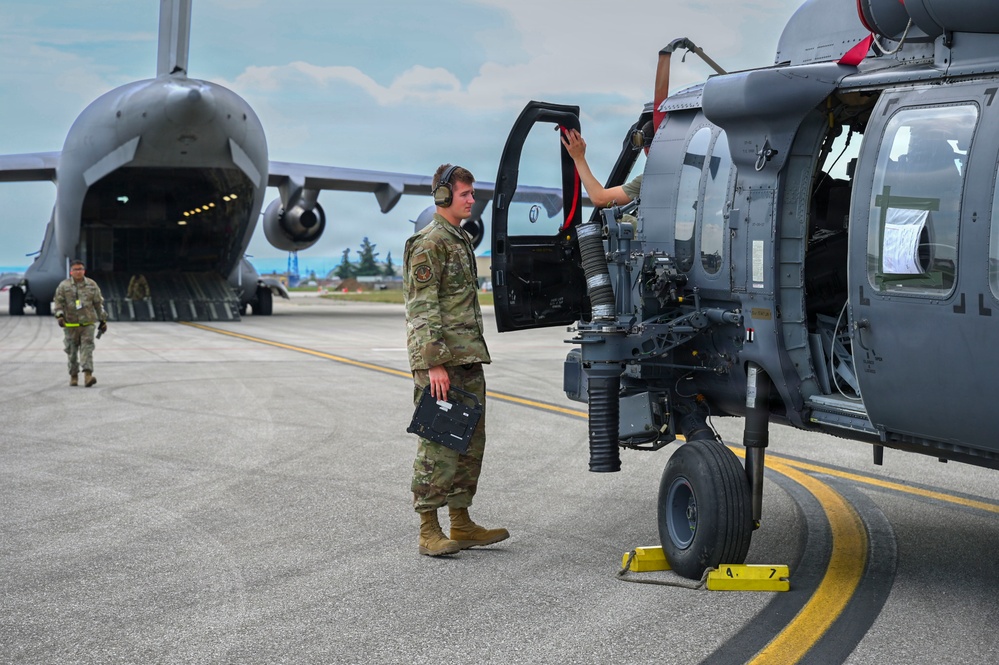 56th RGS load an HH-60W onto a C-17 for a routine deployment