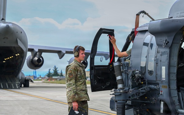 56th RGS load an HH-60W onto a C-17 for a routine deployment