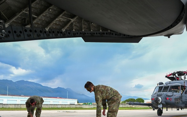 56th RGS load an HH-60W onto a C-17 for a routine deployment