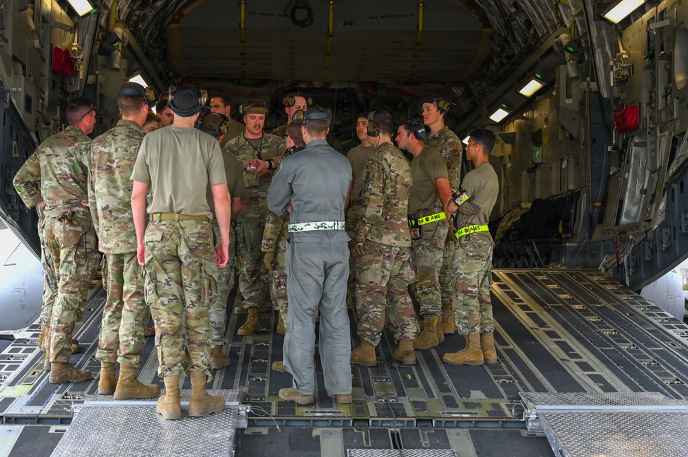 56th RGS load an HH-60W onto a C-17 for a routine deployment