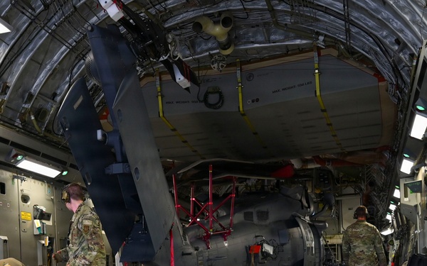 56th RGS load an HH-60W onto a C-17 for a routine deployment