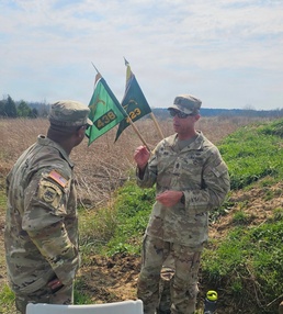 Command Sgt. Maj. Tomothy Nein talks with 1st Sgt. Clifford Marbrey