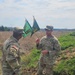 Command Sgt. Maj. Tomothy Nein talks with 1st Sgt. Clifford Marbrey