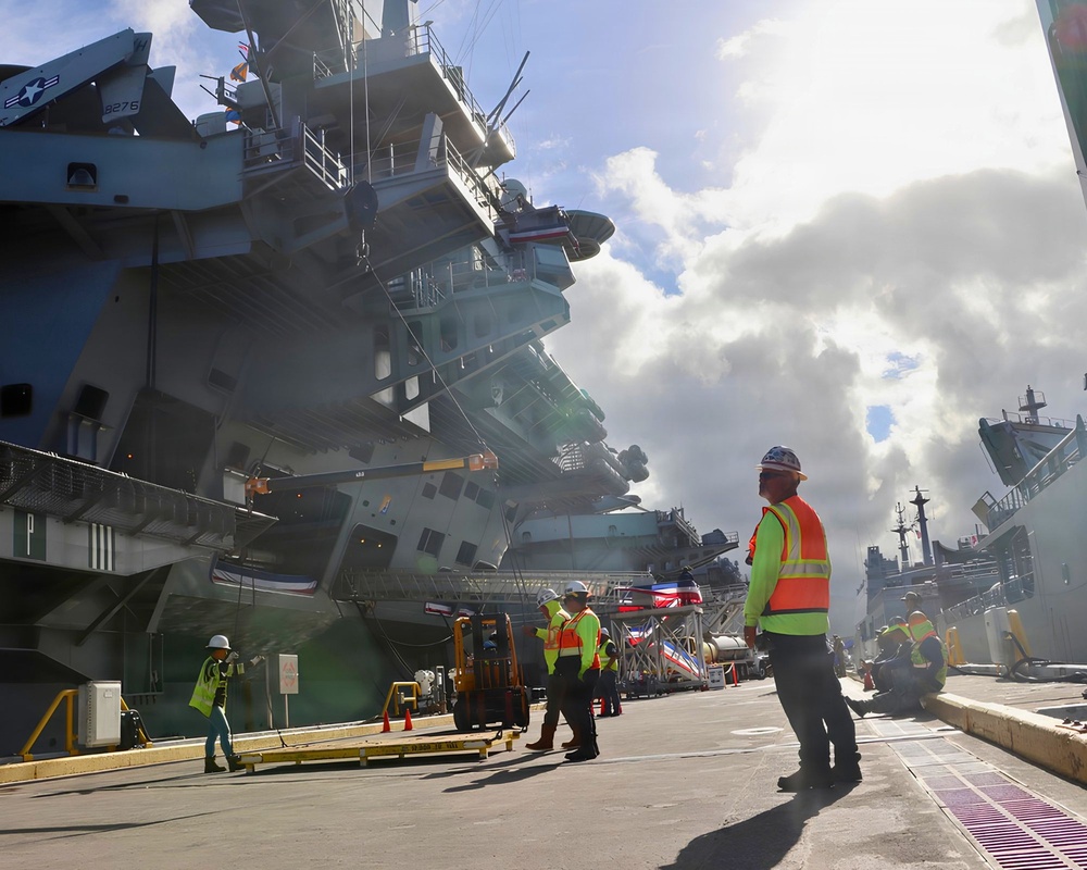 NAVSUP FLC Pearl Harbor facilitates crane operations in the early morning light for ships participating in Exercise Rim of the Pacific (RIMPAC) 2026