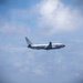 P-8A Poseidon Flies Over USS Nimitz