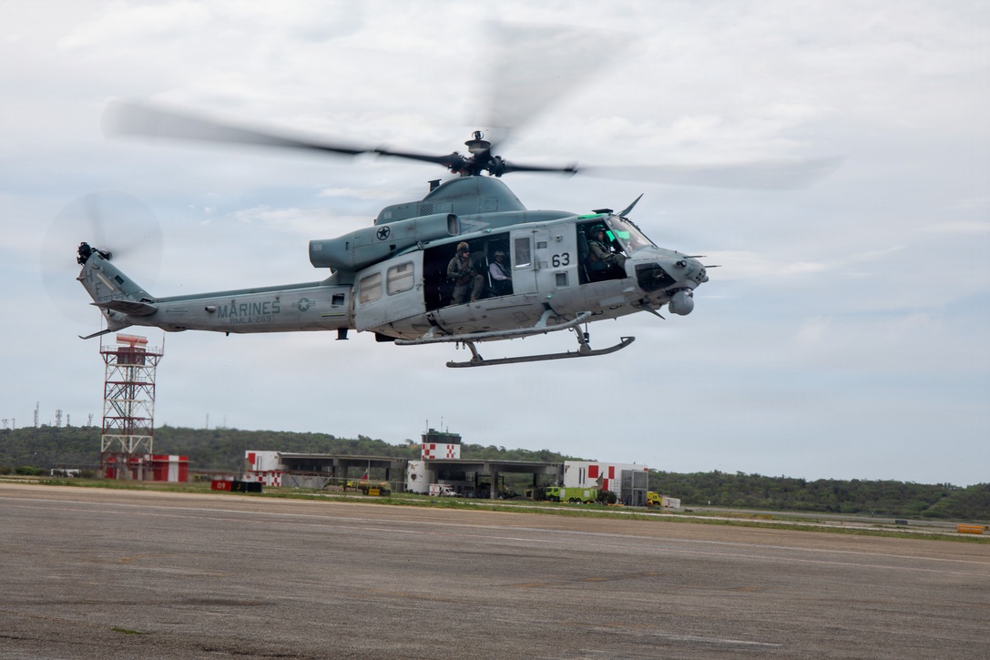 A U.S. Marine Corps UH-1Y Venom assigned to Marine Medium Tiltrotor Squadron (VMM) 365 (Reinforced), Littoral Combat Force-24, prepares to land during an aerial damage assessment flight, at Simón Bolívar International Airport, Caracas, Venezuela, June 28, 2026. At the direction of U.S. Southern Command, assigned U.S. military forces are supporting Department of State-led U.S. disaster assistance to the people of Venezuela in the aftermath of the June 24, 2026, earthquakes. (U.S. Marine Corps photo)