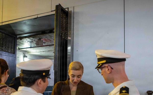 U.S. Navy Officers Interact with Civilian During Fleet Week Event