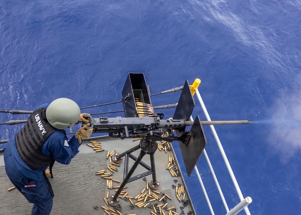 USS Frank Cable conducts gun shoot