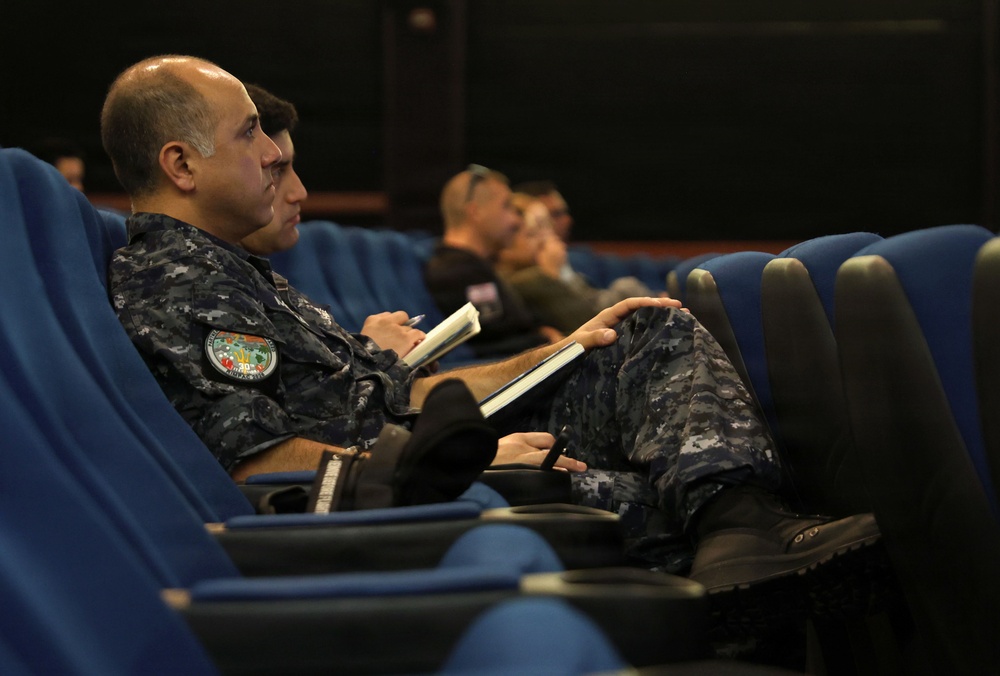 Partner nation service members attend IAMD presentation during RIMPAC 2026