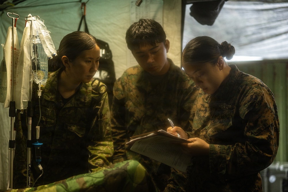 HIJYUDAI MANEUVER AREA, OITA, JAPAN – U.S. Marines with 3rd Medical Battalion Execute Billateral Medical Simulation During Exercise Resolute Dragon 26