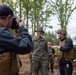 U.S. Marine Corps explosive ordnance disposal technicians engage with international media in Latvia