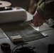 U.S. Marine Corps explosive ordnance disposal technicians engage with international media in Latvia