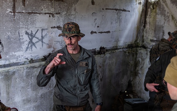 U.S. Marine Corps explosive ordnance disposal technicians engage with international media in Latvia