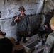 U.S. Marine Corps explosive ordnance disposal technicians engage with international media in Latvia