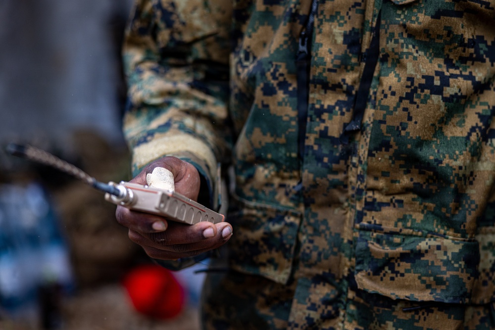 U.S. Marine Corps explosive ordnance disposal technicians engage with international media in Latvia