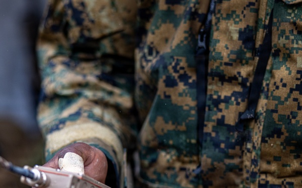 U.S. Marine Corps explosive ordnance disposal technicians engage with international media in Latvia